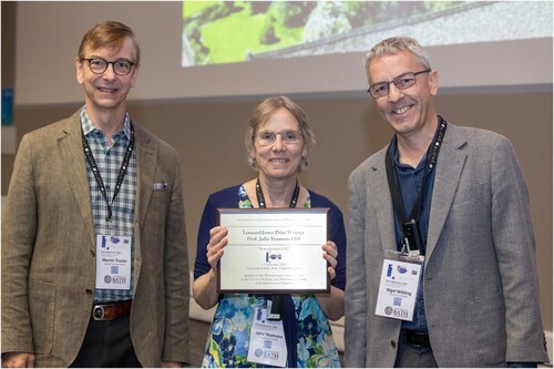 Figure 2. Recipient of the 2022 Lennard-Jones Lectureship and Prize: Julia Yeomans (centre), Professor of Physics at the University of Oxford, UK (presented by Nigel Wilding (right) and Martin Trusler (left), representing the SMTG of the RSC).