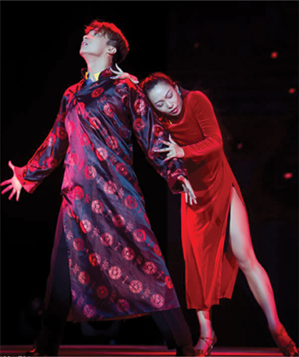 Figure 3. Together again after the war performed by Mengjia Cui and Yulin Jiang in the 2015 CBDF creative showdance competition.