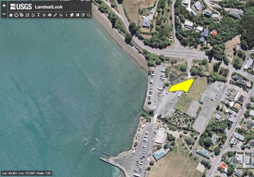 Figure 4. Akaroa boat launch and freedom camping area in yellow. Source: USGS LansatLook (2019).