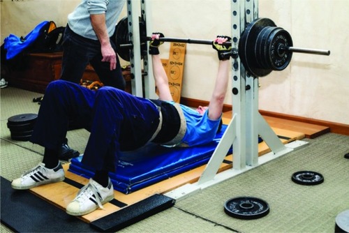 Figure 3 Chest lift: barbell system positioned according to Anatoly Gravitational System.