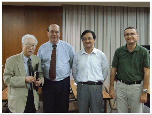 Figure 2. Osamu Hayaishi, Clifford Saper, Zhi-Li Huang and Michael Lazarus at Osaka Bioscience Institute (OBI; left to right), ca. 2007. Clifford Saper (from Harvard Medical School) was a speaker at OBI's Monthly Lecture series on several occasions and was a member of OBI's Board of Advisors from 2010–2013. Osamu Hayaishi is a great admirer of Professor Saper's work on the hypothalamic regulation of body temperature, sleep and circadian rhythms.Citation32,33 Photo Credit: Michael Lazarus, Japan.