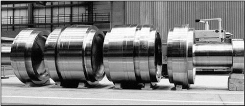 Figure 1. Assembly of forged turbine disks of different material grades for the production of a welded turbine rotor [Citation7].