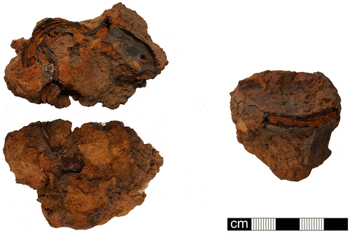 fig 6 The iron agglomeration containing a ring (right), and the iron agglomeration containing a mount, three rings and a fitting. Photograph by Rob Collins.