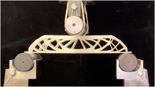 Figure 15. Experimental set-up for the 3-point bending test using a 100 kN Instron machine.