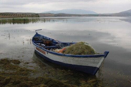 Figure 3. Morning fog and fishing boats on Lake Marmara, June 2010. Photo courtesy of author.