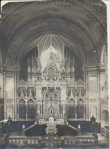 FIG 6 The mizrah (Eastern wall) and the Torah ark of the New Synagogue with the parochet (richly ornamented curtain covering the Torah Ark) designed specifically for the inauguration. © Hungarian Jewish Archives F97.144.