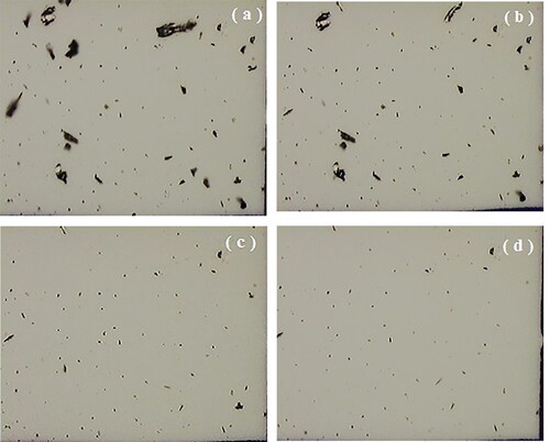 Figure 5. Typical photomicrographs of the soot on the first zone (2 x 2 mm) of the cellulose ester membrane disks proof after detachment forces of 63.7; 1,593.2; 5,161.8 and 12,490.3 RCF (a to d), for the press-on force of 255.0 RCF and pore size of 0.2 µm.