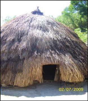 Fig. 1 Ume Kbubu traditional house in Timor community, often called rumah bulat or “round house,” as reflected by its physical shape.