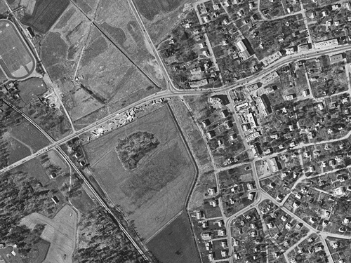 Figure 2. Aerial photo of Lungo Than (Eng. The Long Place) camp, Southern Stockholm, inhabited 1957–1958 and located in the centre of the picture just south of the road. The camp was a predecessor of the Skarpnäck Camp. Photo courtesy of Lantmäteriet.