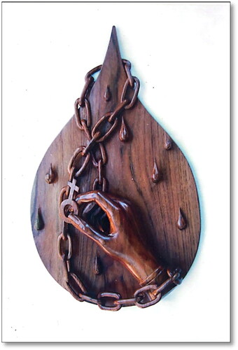Figure 5. Give us our rights.Author: Wahyono.Size: 45 × 40 × 5 cm.Material: Teakwood (2022).
