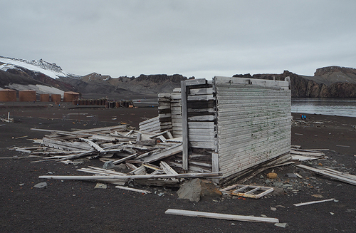 Figure 9. The remains of the magistrate’s Villa in Whalers Bay on Deception Island. The Norwegian whaling station dating to 1906–1931 constitutes some of the most significant whaling remains in Antarctica. Base B, a British meteorology and geology station (1944–1969) reused this building. The site is designated as Historic Site No. 71 under the Antarctic Treaty.