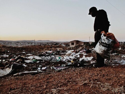 Figure 1. Garbage. People give me dirty looks, as if I am not worth anything. Have you been to a sewage drain? That is how people pull their noses when they see me. This filthy and foul-smelling place is how I think they see me. Photographed by: Devon.