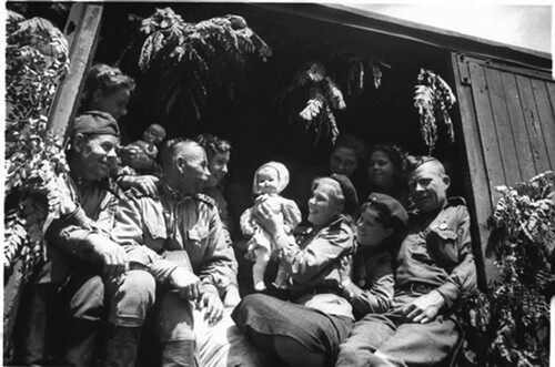 FIGURE 3 A group of veterans photographed by Natalia Bode, Berlin, 10 July 1945. This photograph and several others of this demobilization echelon can be accessed at https://en.topwar.ru/29894-natalya-bode-voyna-glazami-zhenschiny.html (Last accessed 4 February 2022).