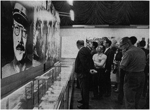 Figure 4. Photographer unknown, ‘Photographs on display in the “National Propaganda” section of A Century of Japanese Photography’, 1968. On the far left, Prime Minister Tōjō Hideki’s portrait from the front page of the photography magazine Asahi Camera during World War II. Photomechanical print. In Nihon shashinka kyōkai kaihō (Japan Professional Photographers Society Newsletter), no. 19 (1968), 22. 6 × 8.2 cm. With permission of the Japan Professional Photographers Society.