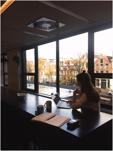 Figure 4 The producer of The Fabricant talking virtually to a client in their spacious studio, shared with another company and located in the center of Amsterdam. Photo: author.