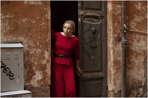 Figure 2 Tomato-red Lavin Pantsuit. Jodie Comer as Villanelle – Killing Eve – Season 2, Episode 8.Photo Credit: Gareth Gatrell/BBC America.