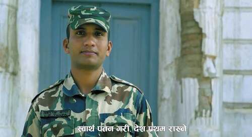 Figure 7. A young member of the Nepal Army, with the lyric svartha patan gari desh pratham rakhne, ‘making self interest fall down, putting the country first’. From video of the Word Warriors’ “Timi Paila”.