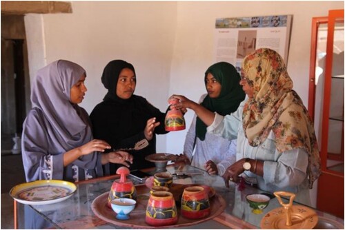 Figure 5. Local graduates preparing the Beit il-Turath Abri displays in March 2019.