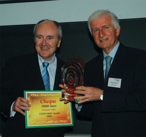Professor Sergio Maluta, 2005 recipient of the ESHO-BSD award, presents the 2006 award to Professor Roland Felix.
