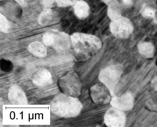 Figure 30. Cementite (majority phase, containing planar faults) and equiaxed ferrite, crystallised from metallic glass films of composition Fe–13.6C at.-% by heat treatment at 300∘C for 3 h. Reproduced from Fillon et al. [Citation192] with permission from Elsevier.