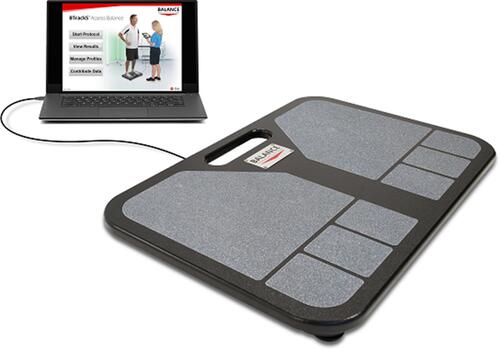 Figure 1 Experimental equipment used in this study included the BTrackS Balance Plate (right) and BTrackS Assess Balance software running on a laptop (left). Image provided is property of corresponding author.