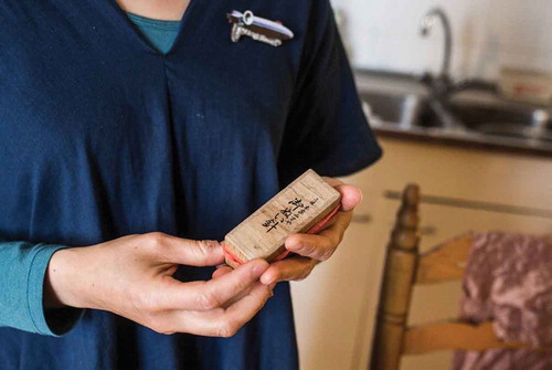 Figure 4. Yuko with her favourite object: Needles from Japan. Picture taken by Natalia Morokhova.