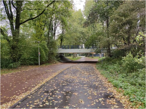 Figure 3. Cars can only access the neighborhood by crossing one of the four short viaducts (photograph by first author).