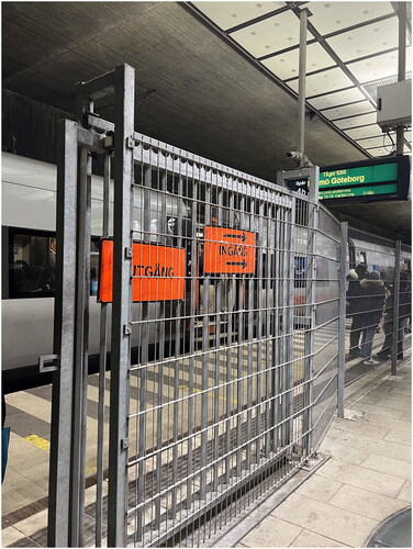 Figure 3. Fenced train track with trains arriving from Denmark. Photo: Marcella Holtz.