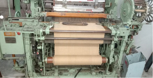 Figure 1. NORTHROP shuttle dobby weaving machine used for development of woven fabric.