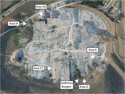 Figure 1 Aerial view of Megiddo, looking north, indicating the excavation areas discussed in the article (courtesy of the Megiddo Expedition).