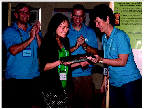 Figure 3. Grace Goh, with Andrew Swanepoel, Peter Kamerman and Andrea Fuller, receiving first prize for her oral presentation.