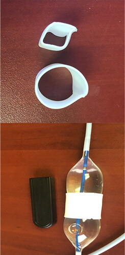 Figure 1. In vitro benchtop balloon dilation of the anisotropic (test) conduit. A 10 mm test conduit is dilated with a 20 mm catheter based balloon to its final diameter of 21.5 mm. Wall tension was not calculated during this test. The black thumb drive is in the image for perspective, measuring 4.5 cm x 1.5 cm.