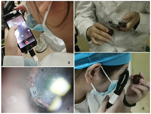 Figure 4. Students using ophthalmoscopes to visualize the fundus of the eye model.