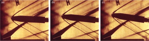 Figure 11. Schlieren photograph of the experimental model in position 2, for Ma = 3 and y2 = l/dc = 1.5201, for (a) α = 3°, (b) α = 5°, and (c) α = 7°.