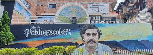 Figure 7. The area in the barrio shown to tourists with a mural of Pablo Escobar and the inscription: ‘Welcome, here one respires peace’ (Author 2022).