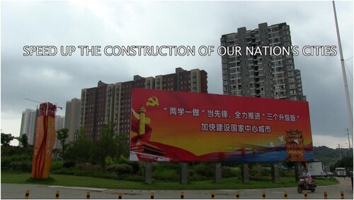 FIGURE 1. The billboard reads: ‘Speed up the construction of our nation’s cities’. (Still Empty Home, minute 14.19).