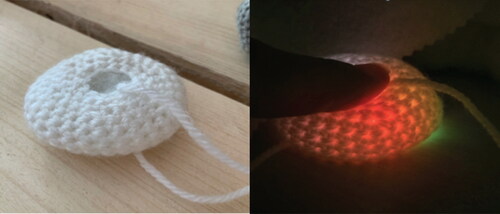 Figure 7 (a, b) Crocheted sensor. Pulse wave modulation (PWM) visualised through light.