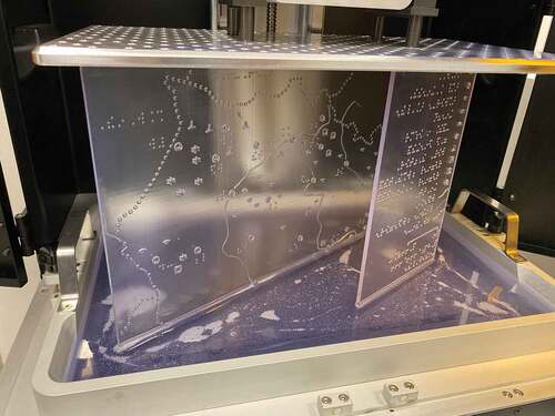 Figure 13. The stereolithography printing process using transparent resin.