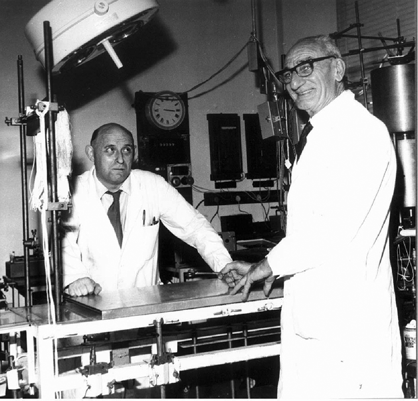 Figure 2. T. J. Surman (right) and S. L. Stone (left) on the day of Surman's retirement in 1972. In the background are some of the original physiological equipment that they used in their teaching and research. Presented with permission of Dr. Robert Maynard, UK Environmental Agency.