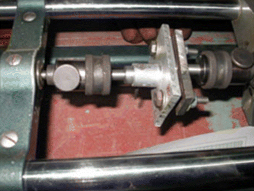 Figure 5 Tube-to-tube plate joint loaded in a tensometer.