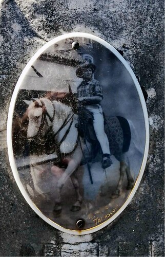 Figure 1. A photograph mounted on a 1965 artifact representing the deceased as a gardian on his horse. An epitaph mentions the deceased’s profession as “manadier.” Photo copyright author.