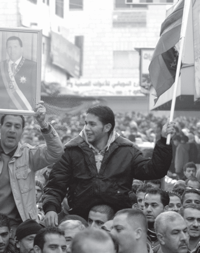 Venezuelan flags and portraits of Hugo Chávez feature prominently at a demonstration in Ramallah, Palestine, in 2009. ISSAM RIMAWI