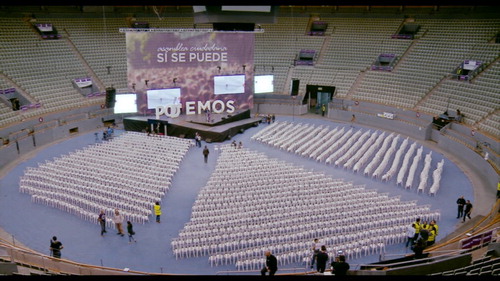 Figure 3. Party members prepare the stage for the Podemos’s 2014 Asamblea Ciudadana. Image reproduced with the permission of Mediapro.