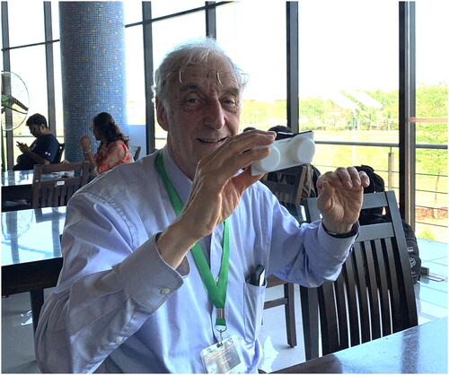Figure 3. Dr. Coleman taking a break during lunch at a computational biology meeting in 2017.Source: Jeffrey Buchsbaum.