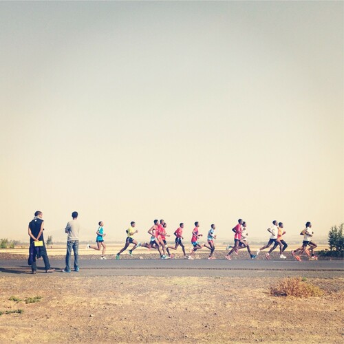 Figure 1. Athletes train in a line in Sebeta, to the West of Addis Ababa.