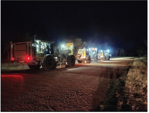 Figure 3. Vibroseis trucks operating at night on the Northwest Northern Territory seismic survey. Data was collected at night to allow the cleanest possible data collection with the least amount of wind and traffic noise.