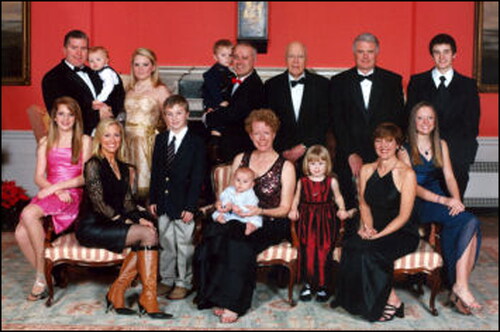 Figure 8. His clan, showing three of the offspring and their children, which now total 11 grandchildren. (John and his family are not in the picture but are shown in Figure 9.)