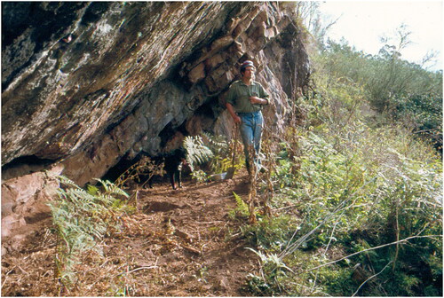 Figure 4. Peter Coutts and dog ‘Digger’ at rock shelter VAHR 8522-0026 at Millukmungee, probably in 1977. (Photographer unknown, courtesy of First Peoples – State Relations).