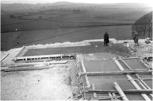 Figure 3 Hillfield (House A), Whipsnade, foundations. Photograph c. 1934, RIBA Collections. The picture probably shows Lubetkin on the foundations of Hillfield.