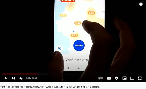 Figure 3. Uber do Marcelo (n.d.) uses his second phone to check the heatmap in a video called ‘Work only during surge and earn around 45 reais in an hour’.